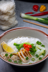 pho soup with chicken meat and vegetables