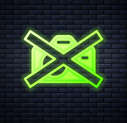 Glowing neon Prohibition sign no video recording icon isolated on brick wall background. Vector