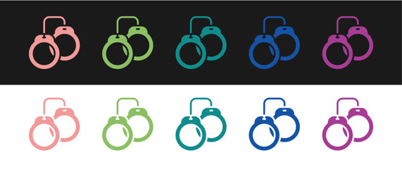 Set Handcuffs icon isolated on black and white background. Vector