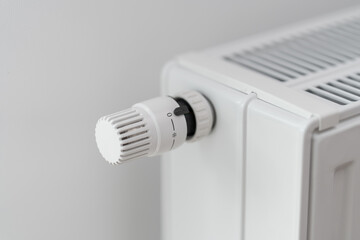 The thermostat regulating the radiator temperature is set to the off position.