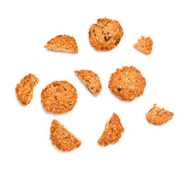 Tasty kozinaki with sesame seeds on white background