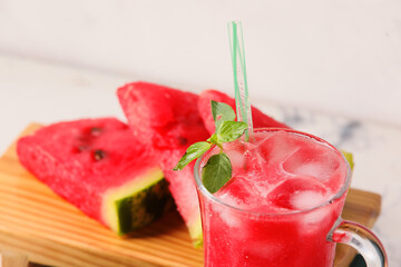 Glass of cold watermelon fresh on light background, closeup