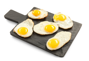 Slate board with tasty fried quail eggs isolated on white background, closeup