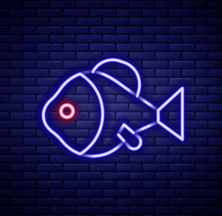 Glowing neon line Fish icon isolated on brick wall background. Colorful outline concept. Vector