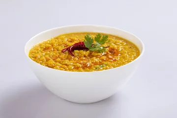 Foto op Canvas Dal tarka, chana dal isolated in white background © Rumee
