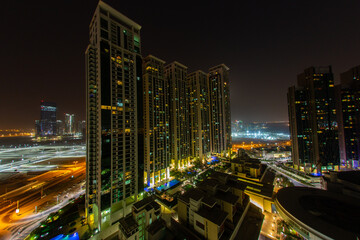 Buildings lit up at night 