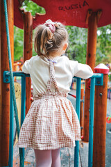 little child playing on playground in varna bapha bulgaria, model shooting, happy, lifestyle