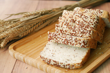 detail shot of whole grain baked bread on table 
