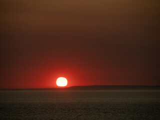 Red sunset over Lundy Island, viewed from Westward Ho.