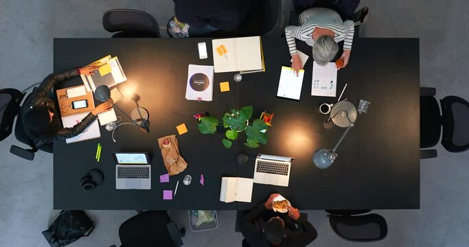 Night business time lapse, dark office team and working overtime with speed, commitment and collaboration in startup agency. Above of fast creative workforce, staff planning and evening strategy