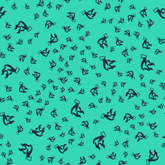 Black Hand holding a fire icon isolated seamless pattern on green background. Vector