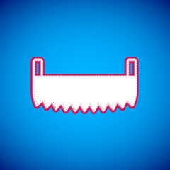 White Two-handed saw icon isolated on blue background. Vector