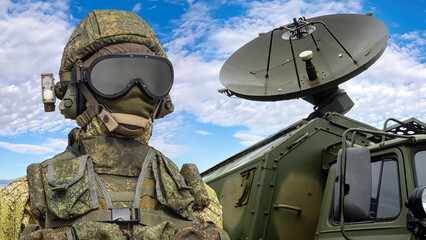 Radioelectronic Intelligence Service. Communications soldier. Man in camouflage uniform and mask with helmet. Radioelectronic satellite dish. Satellite intelligence. Modern military technologies