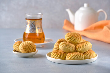 Traditional  arabic semolina maamoul or mamoul cookies with dates , walnuts and pistachio nuts ....