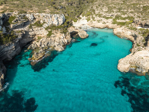 Aerial view of beach with turquoise water, Cala Marmols, Majorca, Spain