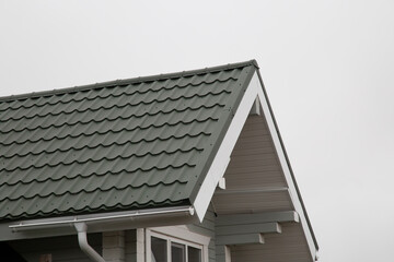 Metal tile.Roof for the house. Modern coatings for the roof of the house. © Александр Поташев