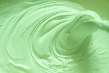 Mixing building mix. Putty for walls. Beautiful slow motion, the texture of the putty is clearly...