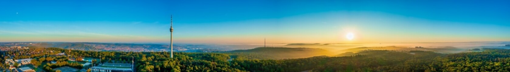 Stuttgart Panorama, Sunrise of the Stuttgart skyline, aerial photo view with tv tower, town architecture, foggy travel photo banner in Germany - obrazy, fototapety, plakaty