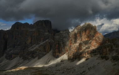 Light breaking through the dark sky in the mountains, atmospheric view, Dolomites, Italian Alps, Italy, Europe