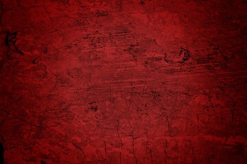 Obraz premium Background from high detailed fragment stone red wall,Vintage wall in industrial building with light from angle, classic red dark slate background, old textured background, red cement wall with dark t