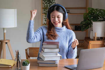 Relax, de-stress, vacation, have fun. Asian women take notes of their own past happily at home.