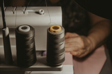 Spools of thread on a sewing machine