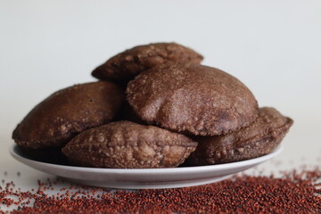 Ragi Poori. Deep fried Indian flat bread made of finger millet and wheat flour.This Poori is an interesting way to include millet in our diet
