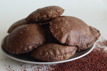 Ragi Poori. Deep fried Indian flat bread made of finger millet and wheat flour.This Poori is an interesting way to include millet in our diet