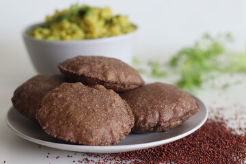 Ragi Poori served with spiced mashed potatoes as side dish