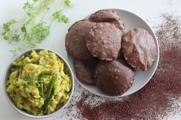 Ragi Poori served with spiced mashed potatoes as side dish