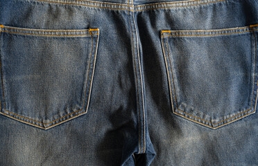 fabric background, denim pants, back pockets