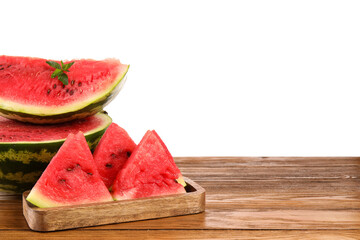 Board with slices of ripe watermelon and mint on table against white background