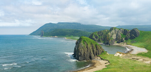 aerial view of the beautiful coastline of Kunashir island with basalt cliffs