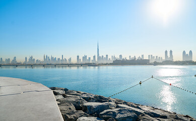 view of Dubai skyline over the sea