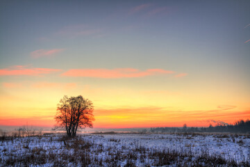 Fototapeta na wymiar Winter landscape, amazing sundown in winter , Poland Europe, river valley Knyszyn Primeval Forest