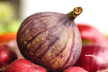 Close-up, fig on a blurred background, macro shot.