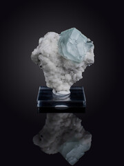 A wonderful item from the mineralogical collection. Fluorite mineral crystal on a black background.