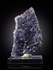 A wonderful item from the mineralogical collection. Fluorite mineral crystal on a black background.