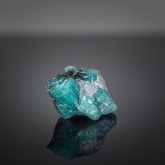 A wonderful item from the mineralogical collection. Beryl mineral crystal on a dark background.