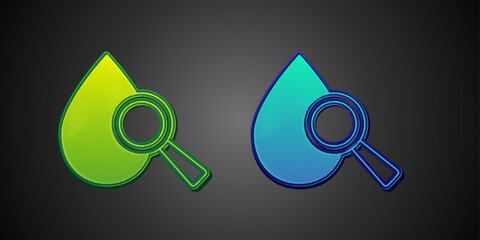 Green and blue Drop and magnifying glass icon isolated on black background. Vector