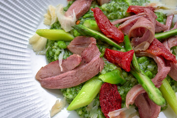 Risotto with turkey, cheese, asparagus and beans