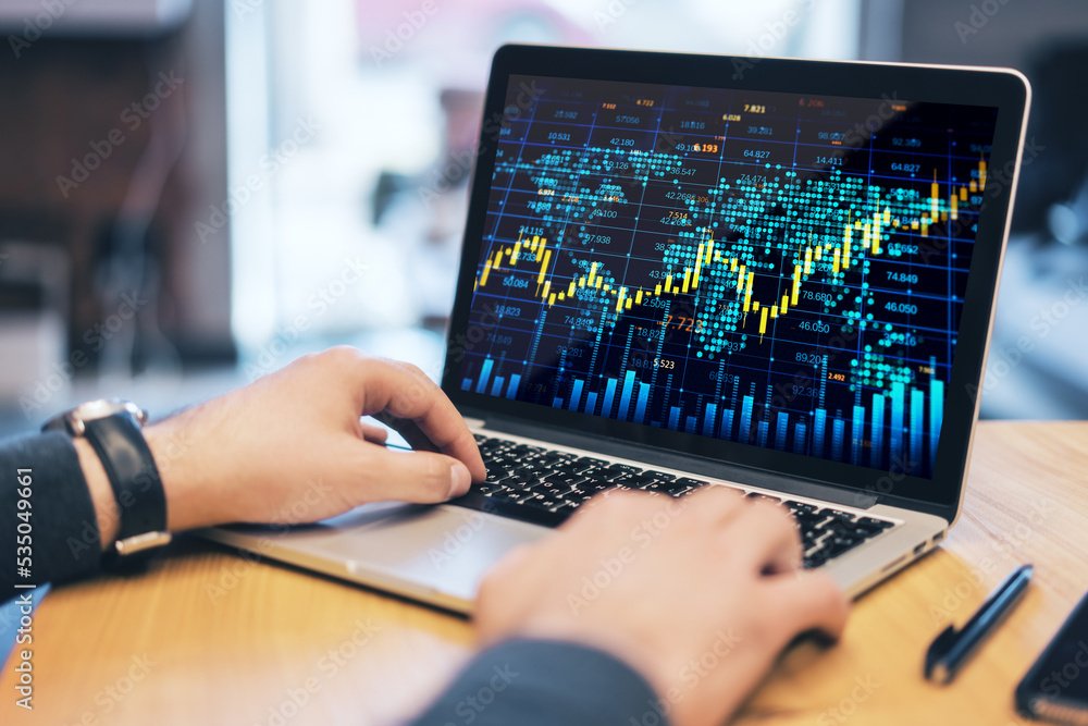 Poster close up of male hands at workplace with creative forex chart with candlestick graph, index and tech