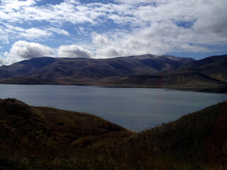 Famous Armenian landscape Lake Sevan, the largest body of water in both Armenia and the Caucasus region. Gegharkunik Province, Armenia. Most popular  Armenian tourist attractions