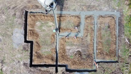 concrete house foundation construction process. aerial view.