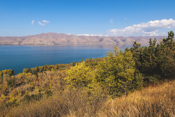 Obraz premium Sevan Lake, Armenia, beautiful aerial panoramic view of Sevan Lake, Gegharkunik Province, with Sevanavank monastery chapel in a summer sunny day
