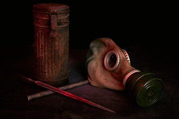 German case for storing a gas mask, gas mask with a filter and a bayonet for a gun