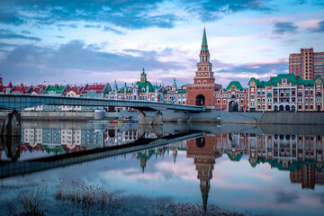 Fototapeta premium Yoshkar-Ola, Mari El, Russia. City architecture. View on the Bruges embankment.