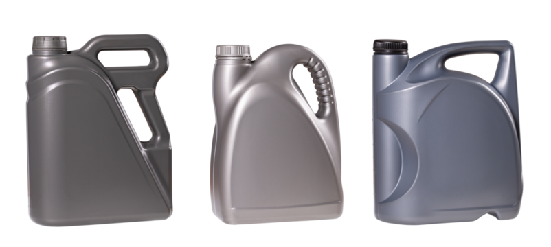 Plastikowe pojemniki na olej do silnika samochodu osobowego.
