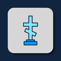 Filled outline Grave with cross icon isolated on blue background. Vector