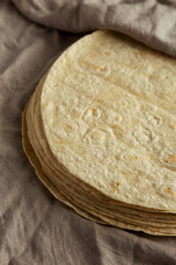 Homemade Wheat Flour Tortillas in a Stack, low angle view. Close-up.